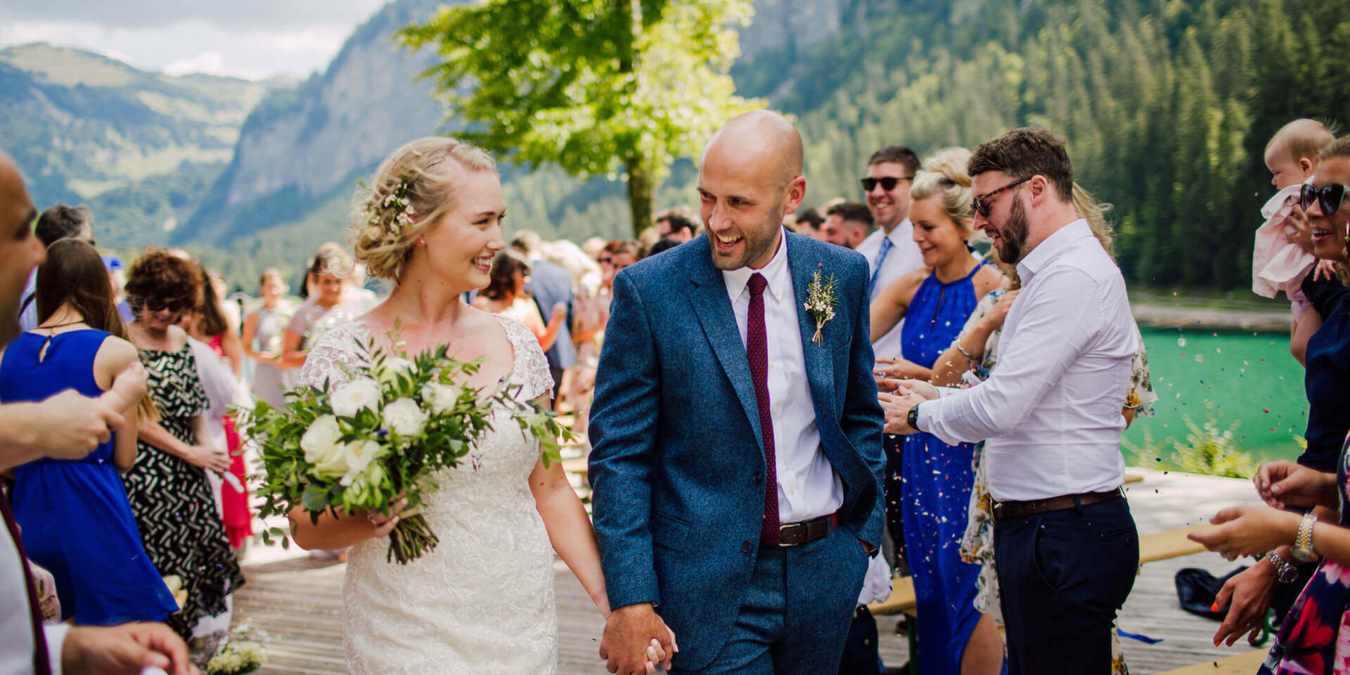 bride and groom celebrating their wedding at the domaine du baron in montriond